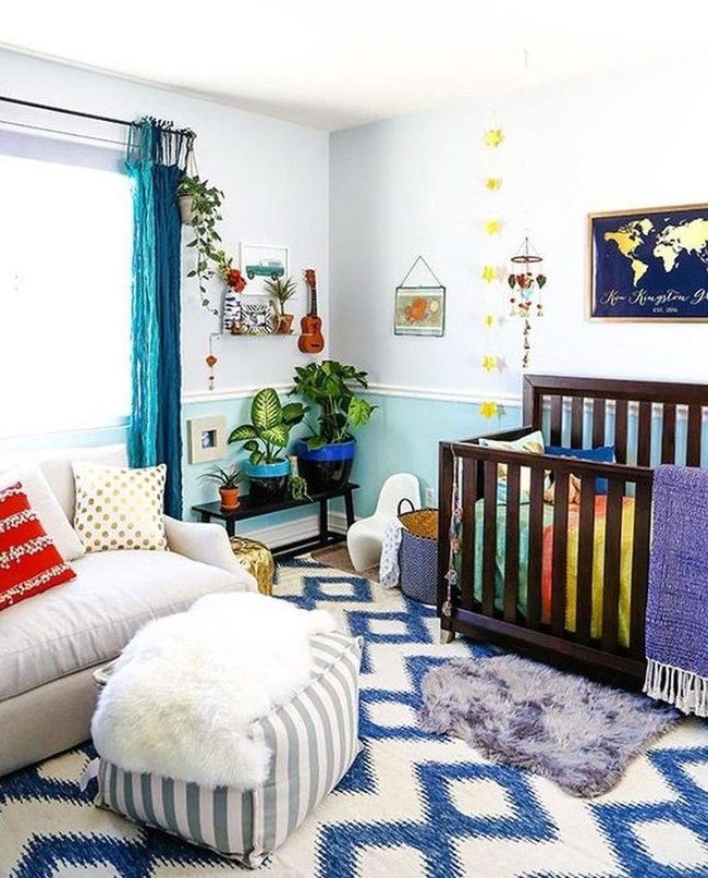 Blue Nursery With Dark Wood Crib