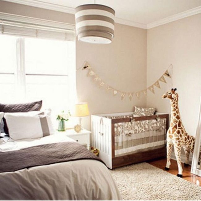 Beige Nursery With Towering Giraffe