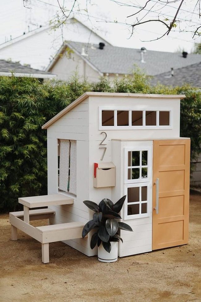 White Wooden Garden Cottage