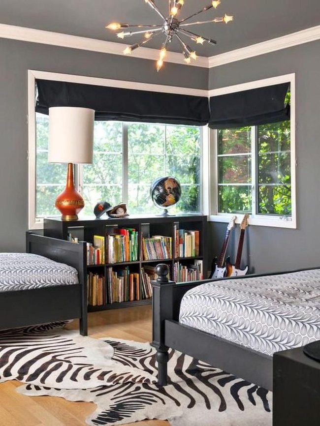 Black Beds, Zebra Rug, Gray Walls
