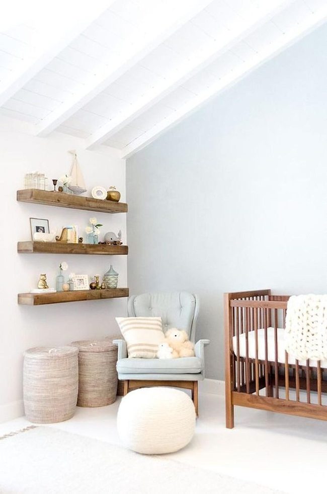 Pale Blue Nursery With Wooden Warmth