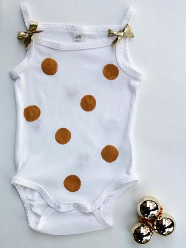 White Onesie With Brown Spots And Gold Bows