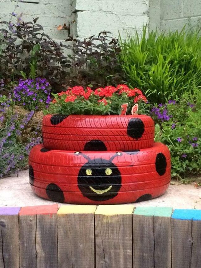Painted Tire Ladybugs Blooming