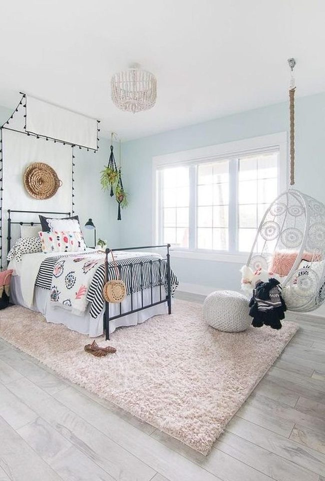 Light Blue Walls With Black Metal Bed