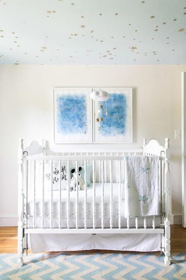 Gold Stars Above White Cribs