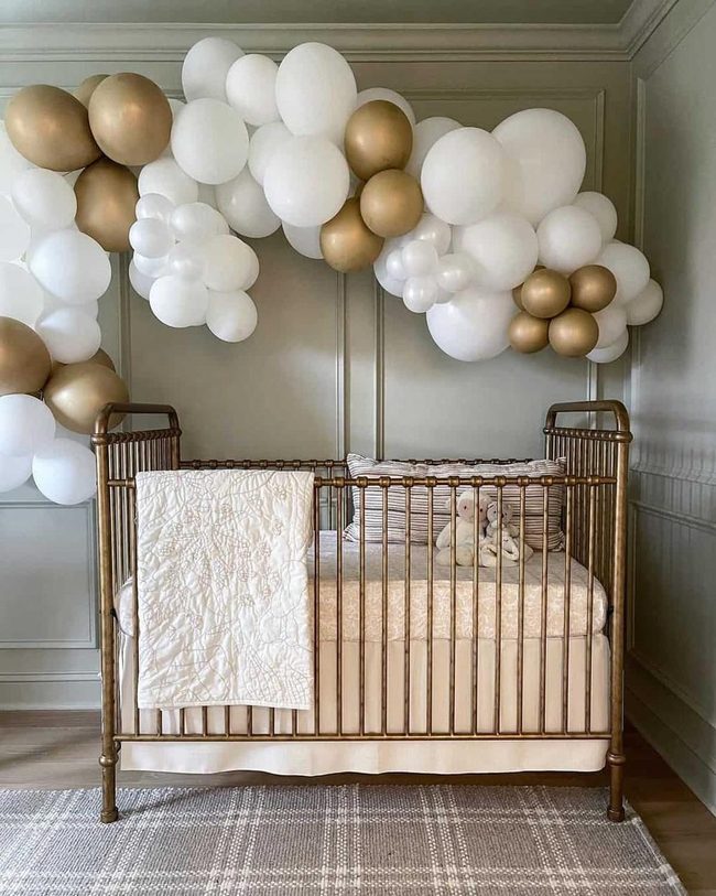 Brass Crib with Gold Balloons