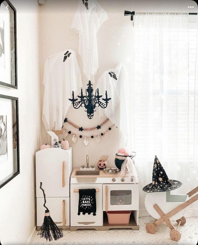 White Ghosts, Black Chandelier, Pink Pumpkins