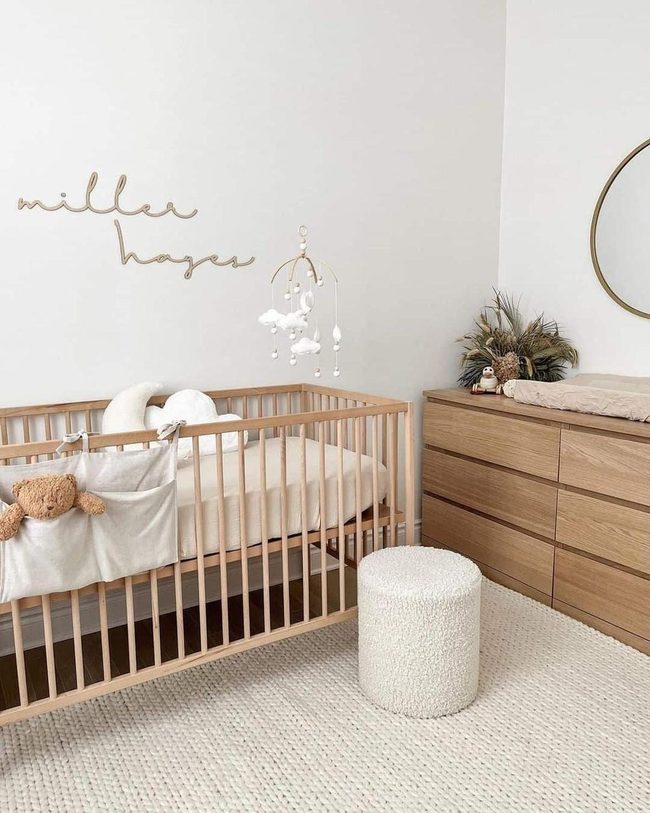 Light Wood Nursery with Brass Mirrors