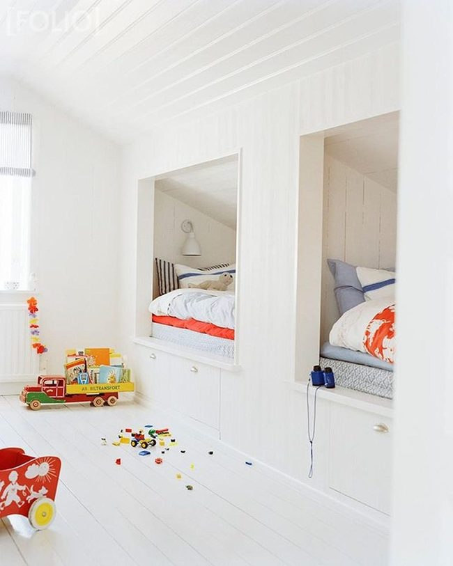 Dual White Beds With Colorful Play