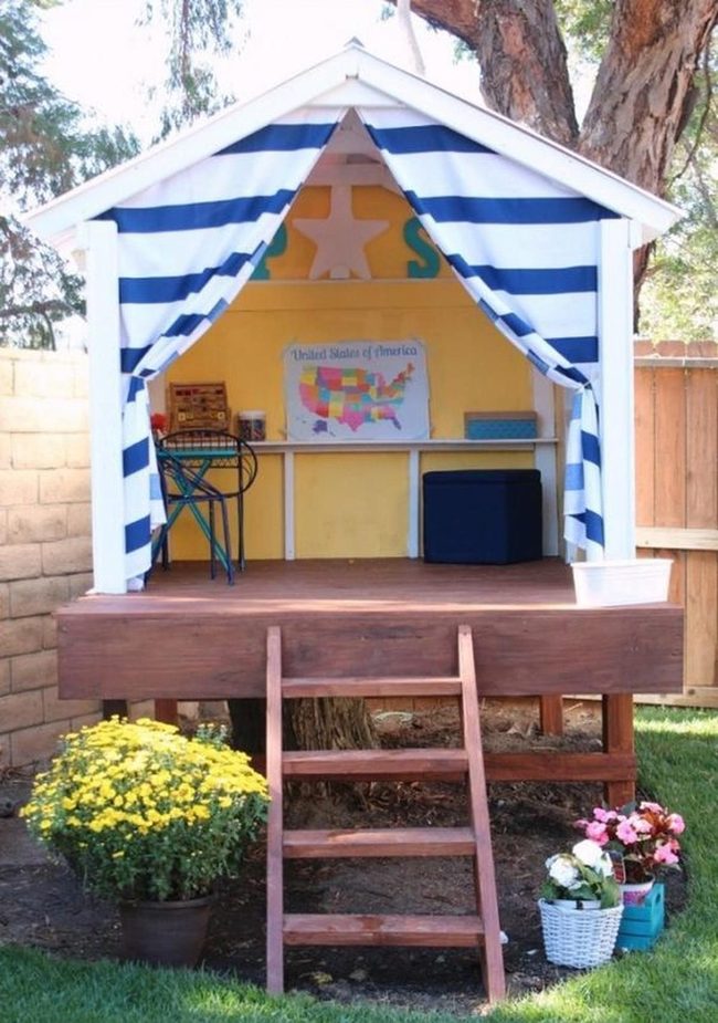 Yellow Wooden Playhouse With Learning Map