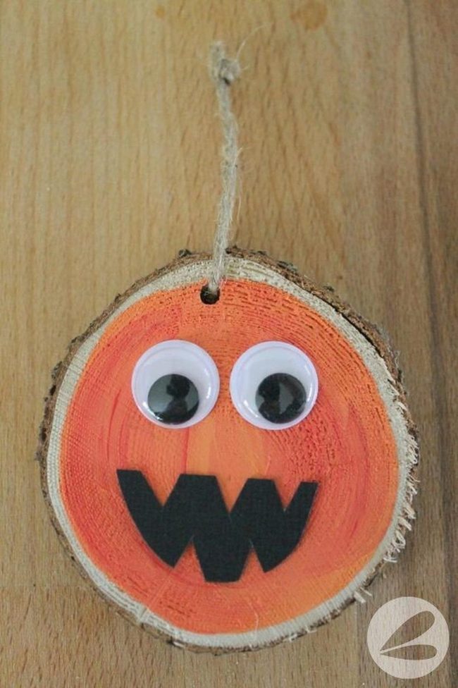 Carved Orange Wood Slice Pumpkins