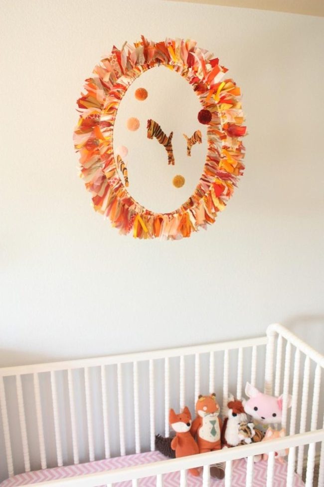 White Crib With Colorful Mirror Frames