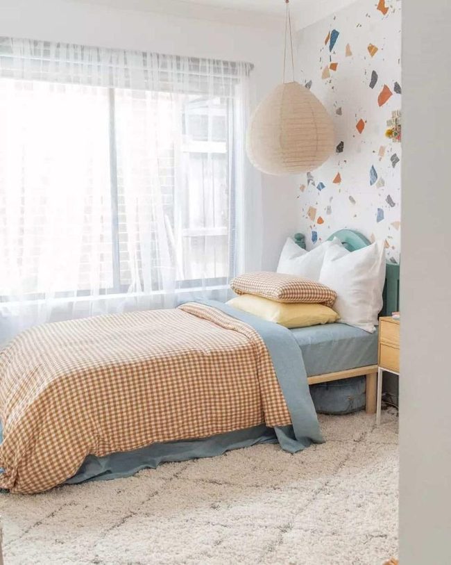 Blue Bed Meets Terrazzo Walls
