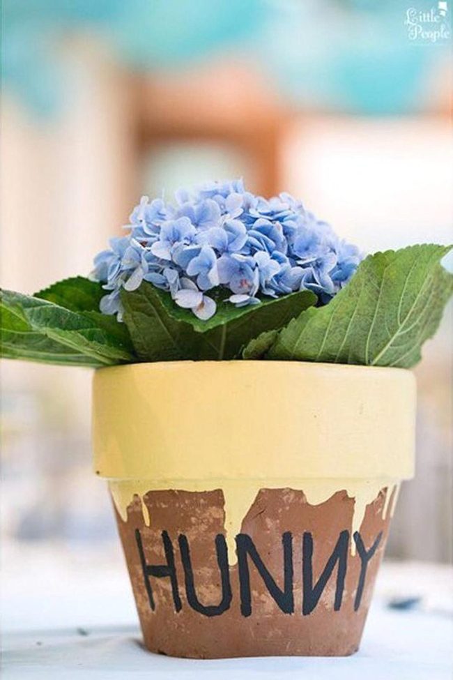 Blue Blooms In Ceramic Vessels