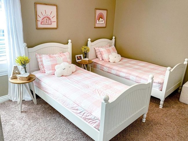 Pink Bedding White Walls Green Plants