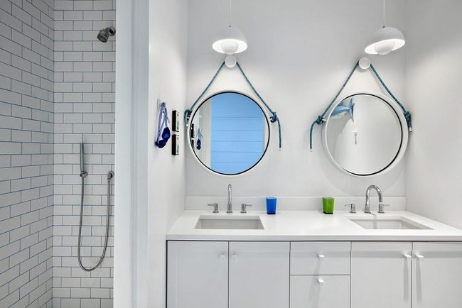 Teal Mirrors And Subway Tile Statement