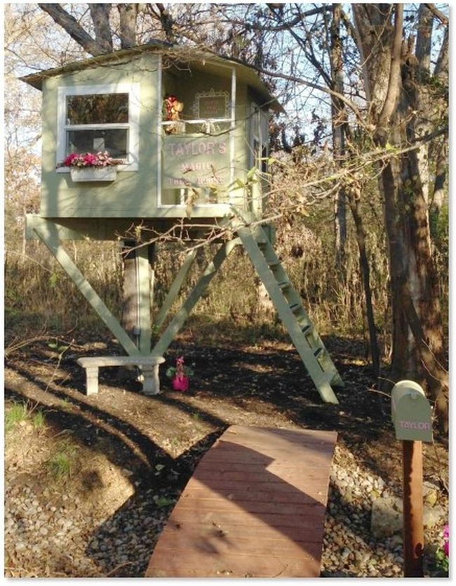 Elevated Green Treehouse With Pink Blooms