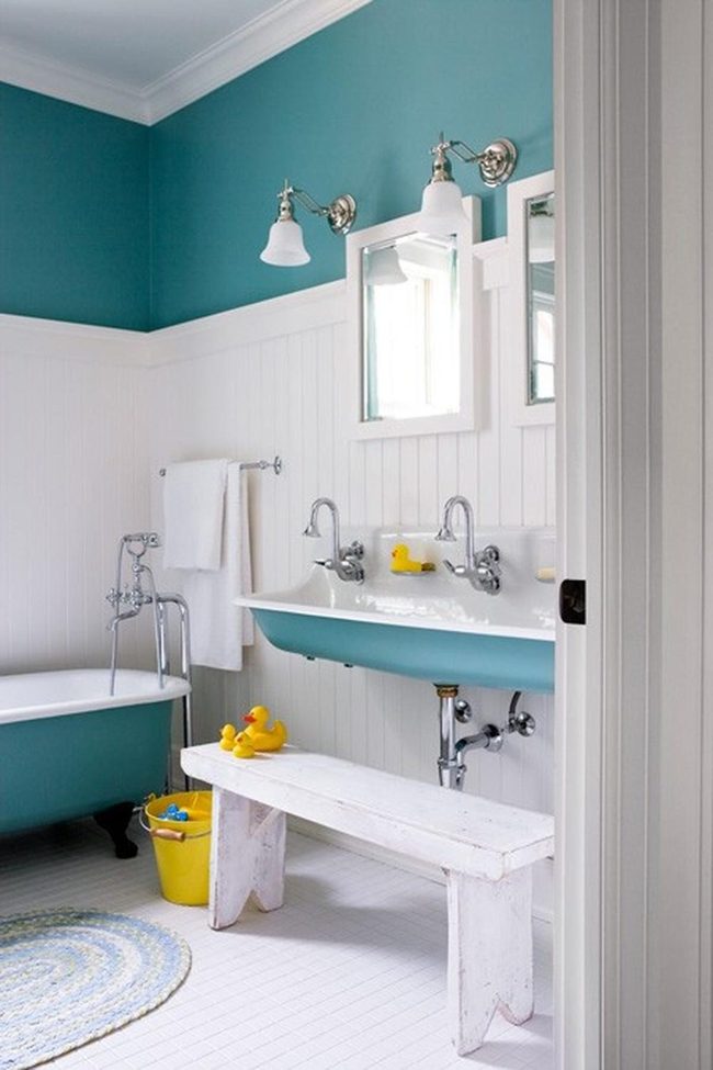 Bright Blue Bathroom With Yellow Ducks