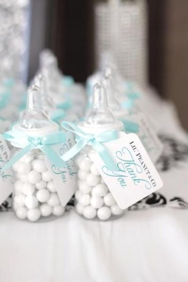 White Candy Bottles With Blue Ribbons