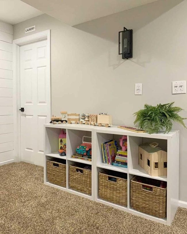 Gray Walls, Wicker Storage, Wooden Toys