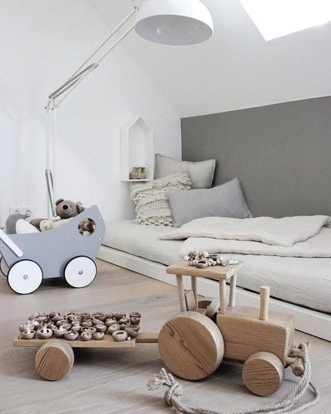 Sunlit Gray Nursery With Wood