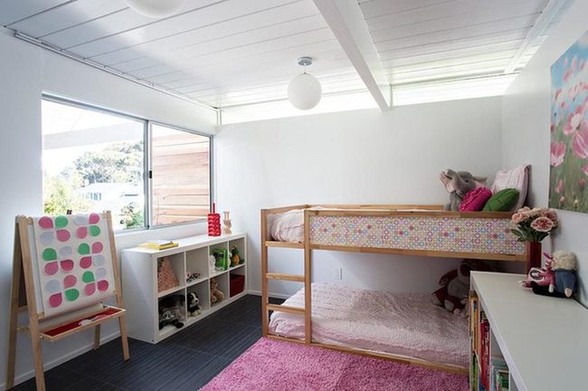 Sunlit Kids Room With Colorful Bedding
