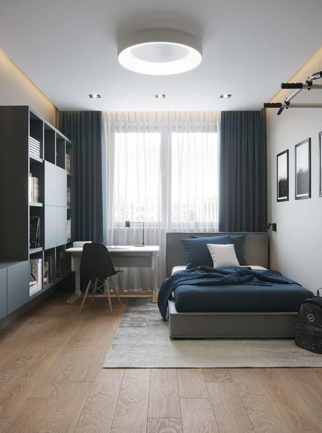 Dark Blue Bedroom With Light Wood