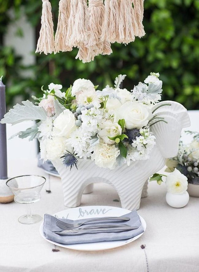 White Ceramic Ram With Sunlit Blooms