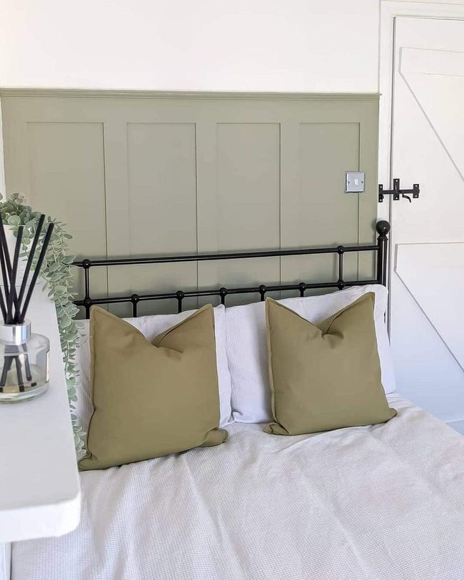 Black Spindle Bed, Sage Green Walls