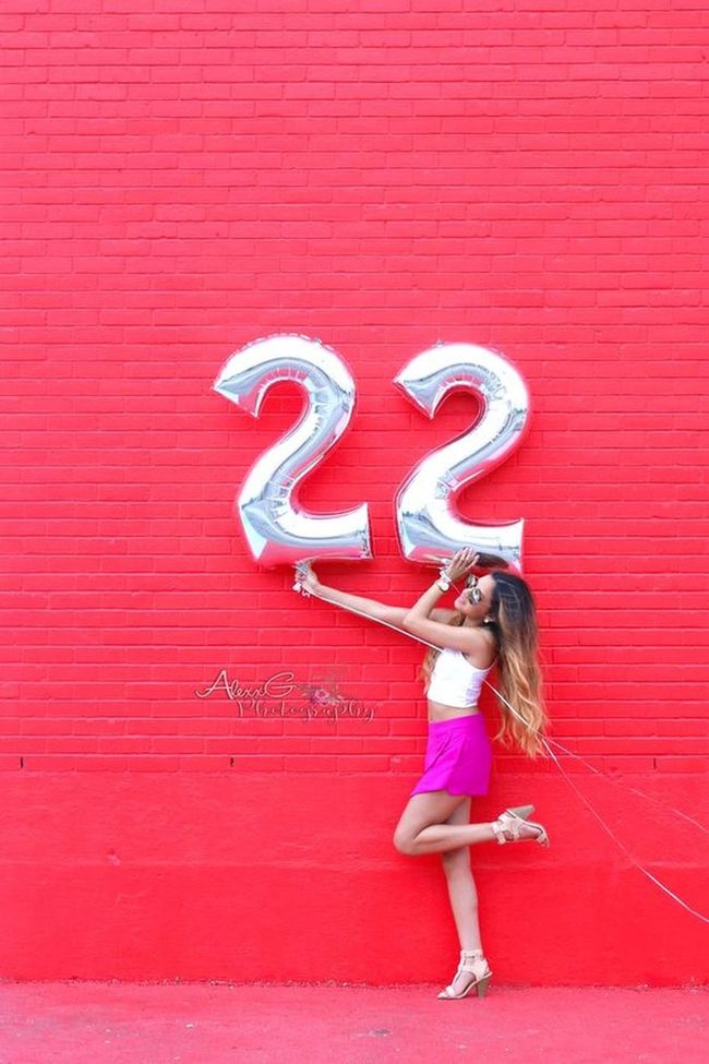 Balloons Against Red Brick