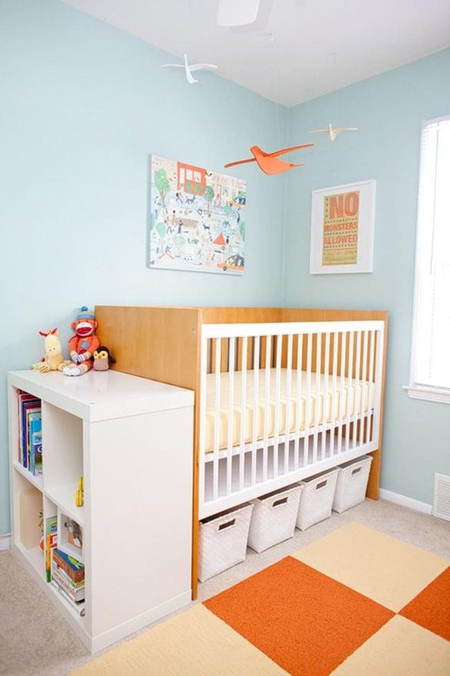 Light Blue Nursery With Orange Accents