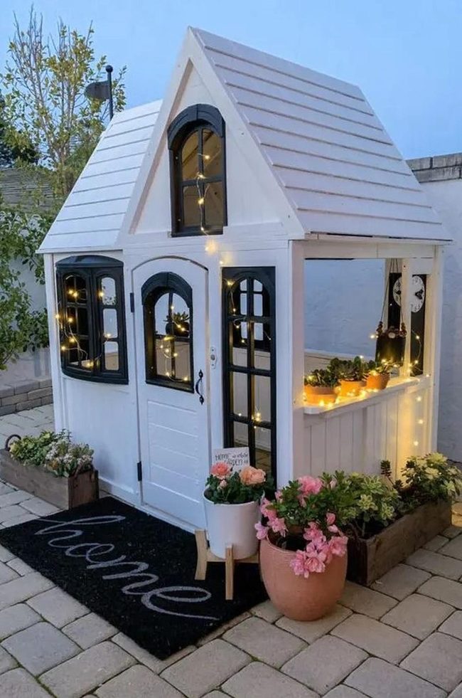 White Cottage With Black Trim Details