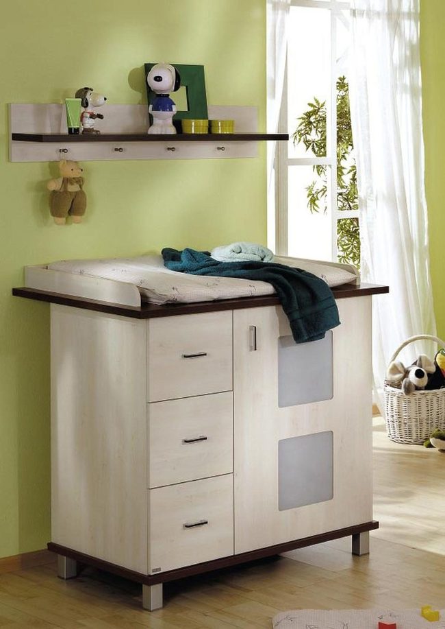 Soft Green Nursery With Wood Details