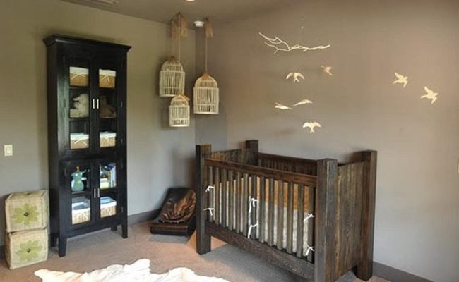 Dark Wood Nursery With Birdcage Accents