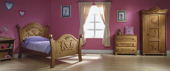 Pink Bedroom With Carved Wood Details