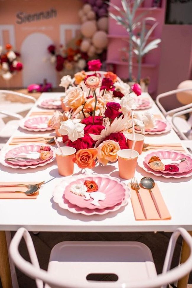 Pink Scalloped Table With Copper Accents
