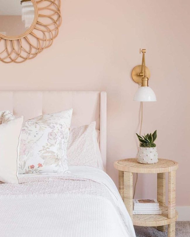 Neutral Wingback Bedroom With Brass Accents