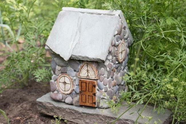 Round Stone Cottage With Wooden Door