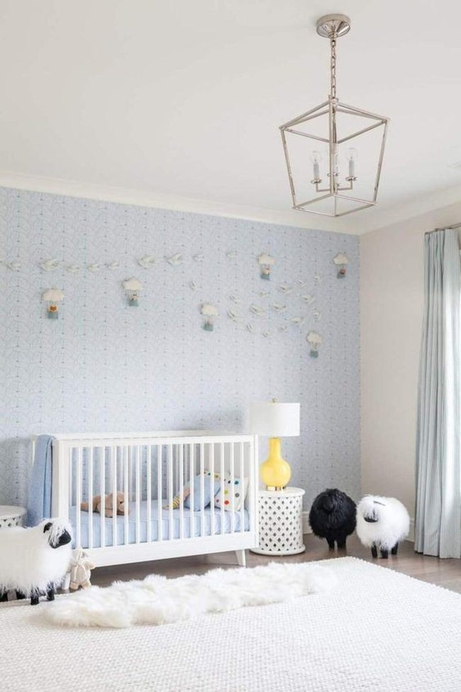 Soft Blue Nursery With Sheep Toys