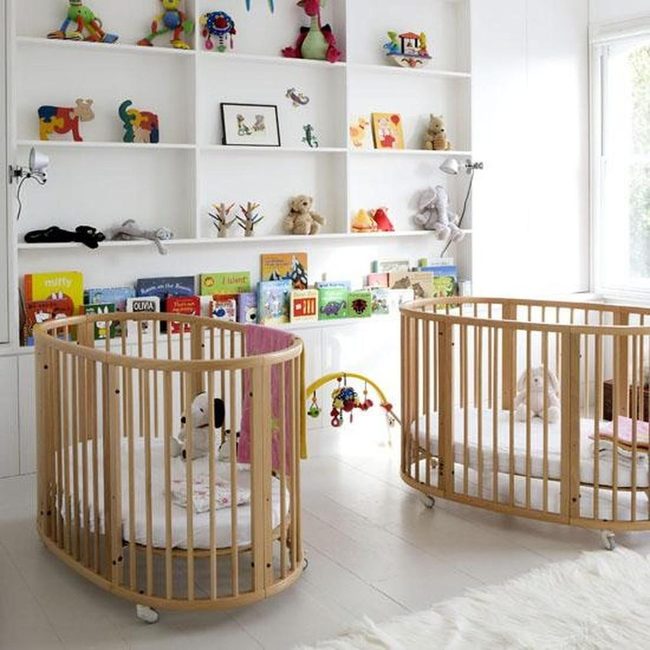 Sunlit Nursery With Wooden Cribs