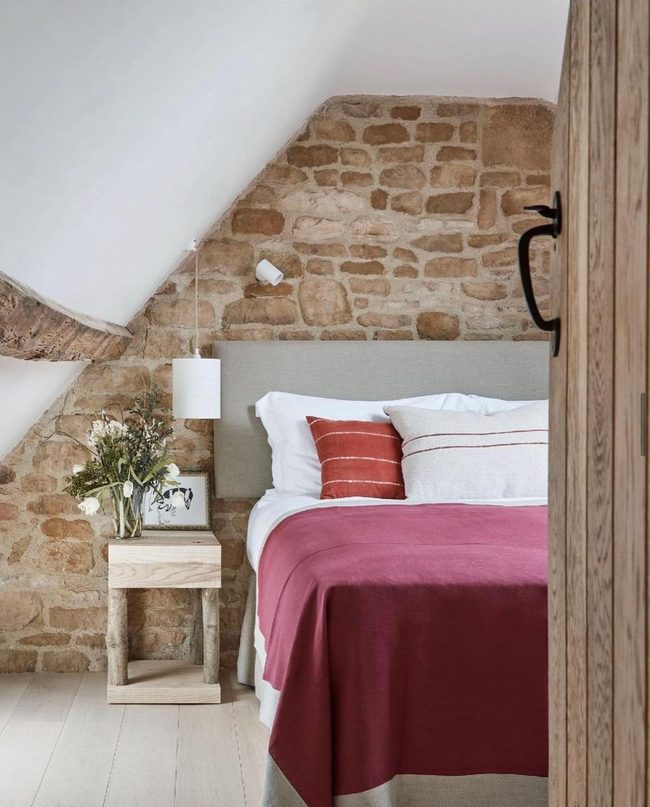 Raw Stone Attic Bedroom