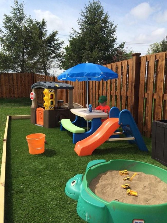 Yellow Playhouse Green Lawn Paradise