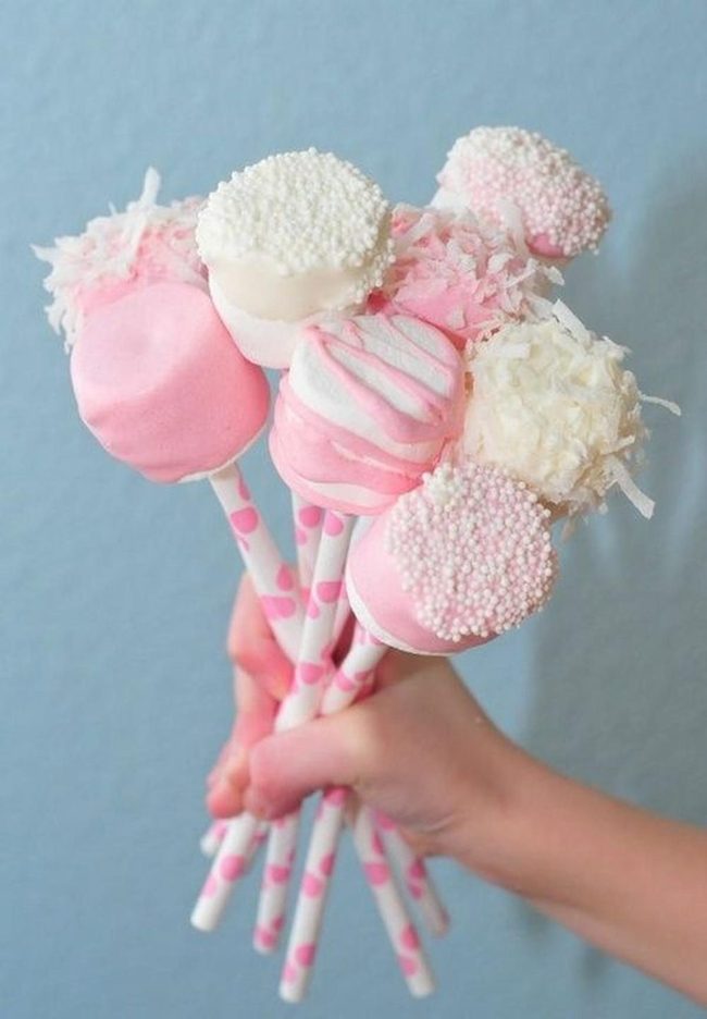 Pink Marshmallow Pops On Blue