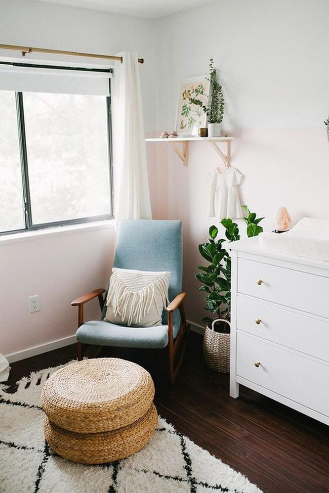 Pink Nursery With Blue Chair And Natural Accents