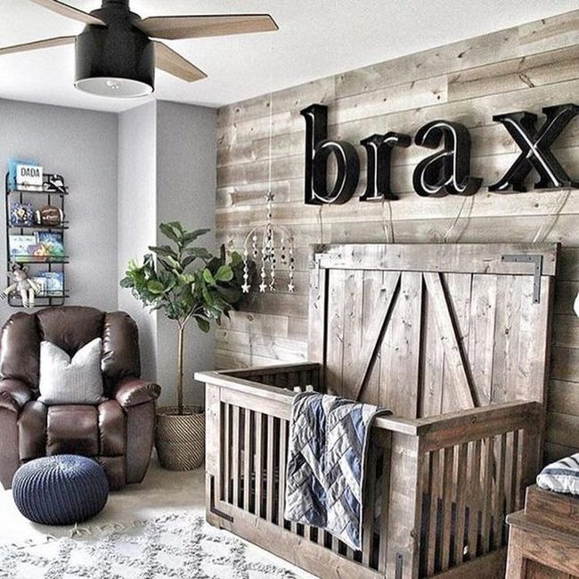 Black Letters Above Wooden Crib