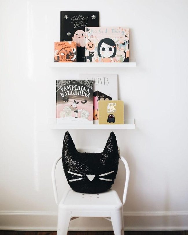 Black Cats On White Chairs