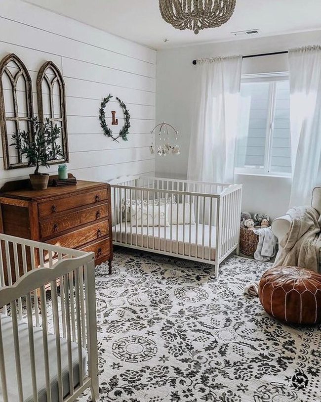 Sunlit Nursery With Twin Cribs