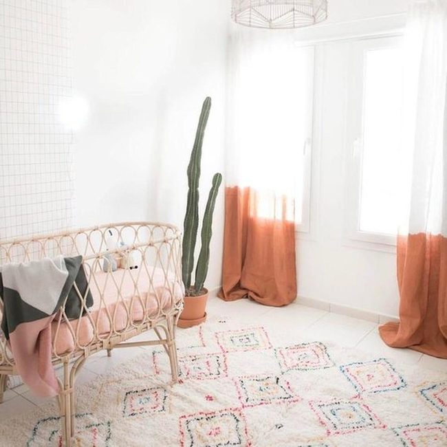 Orange Light Nursery With Geometric Rug