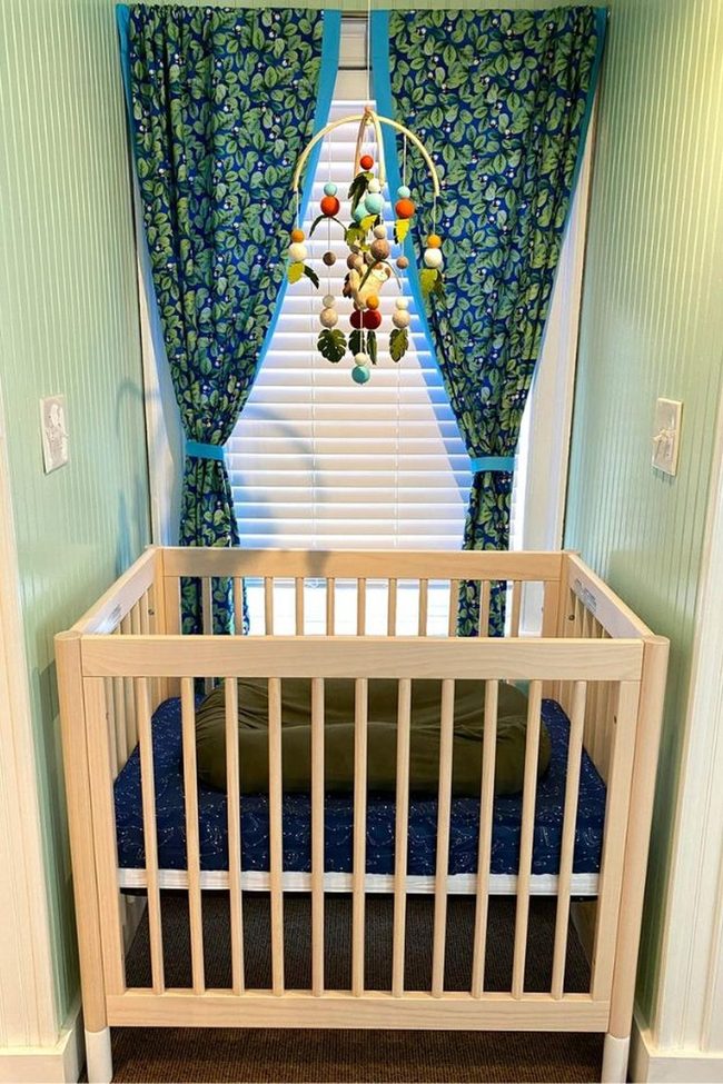Handmade Quilt Over Gender-Neutral Nursery