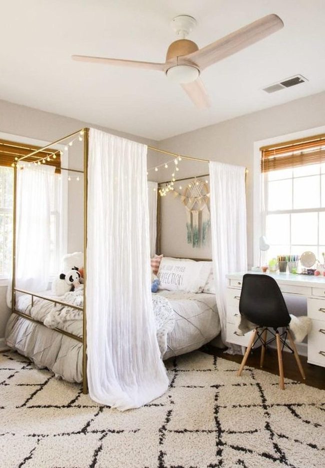 Brass Bed, White Curtains, Black Rug